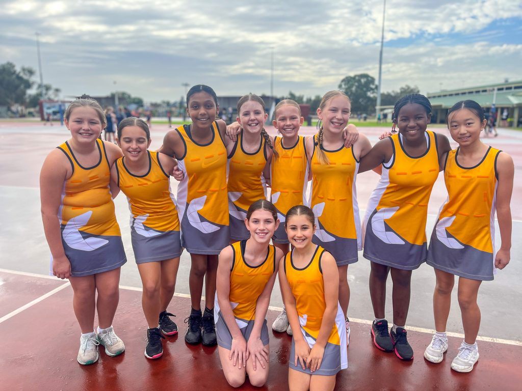 A lineup of the 2024 Carey Harrisdale Year 6 Girls Team 1 Division A WACSSA Inter-school Netball Team